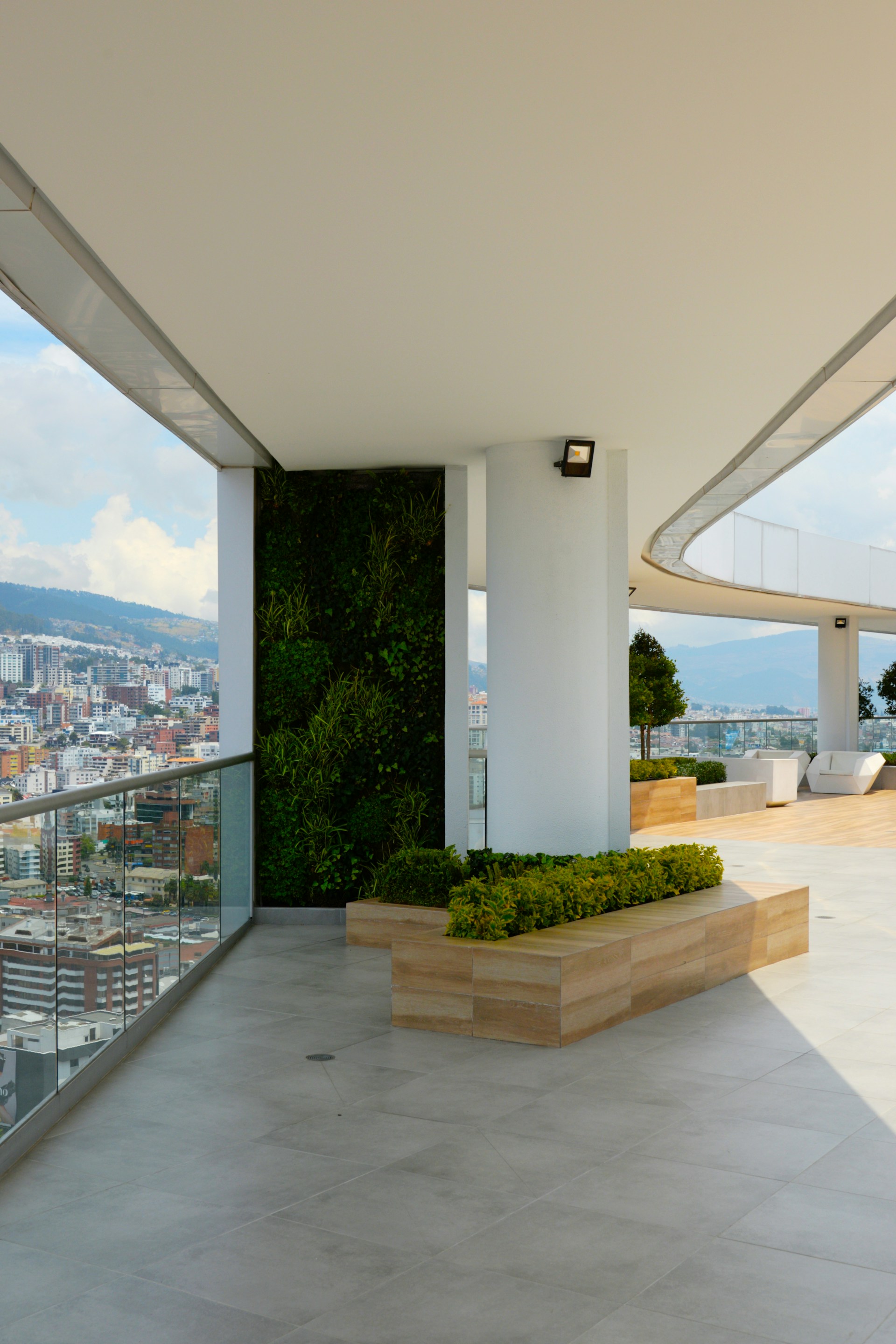 woman wearing yellow long-sleeved dress under white clouds and blue sky during daytime