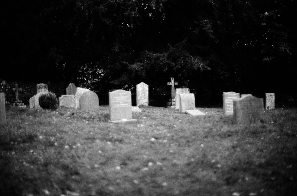 a black and white photo of a cemetery