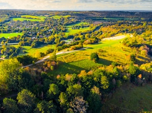an aerial view of a lush green countryside