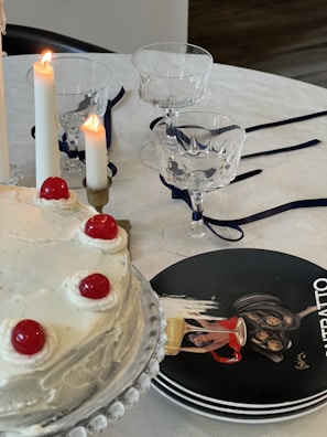 An artistic arrangement of crystal keepsakes for anniversary celebrations on a wooden table.