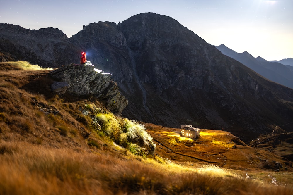 a person standing on top of a mountain