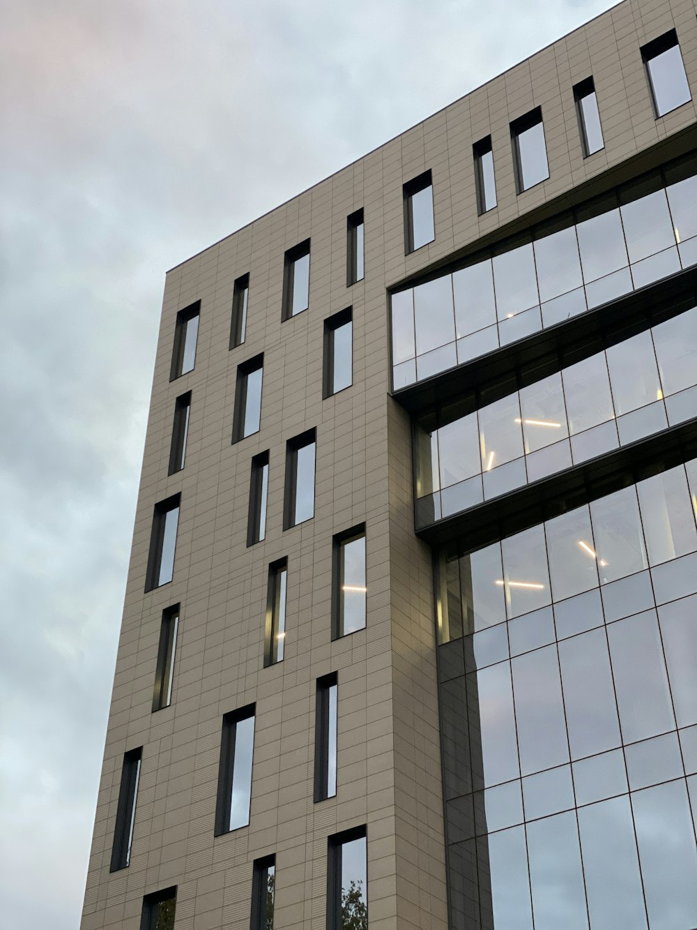 a tall building with lots of windows on top of it