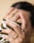 a woman with a ring on her finger