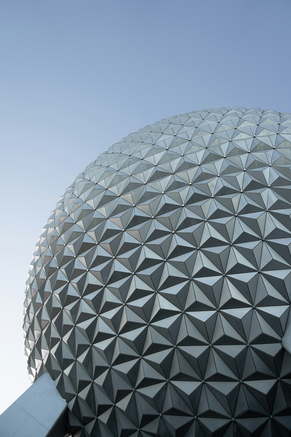 a close up of a building with a sky background