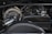 A close-up view of a car engine showcasing a turbocharger with 'BorgWarner' branding. The engine components display a mix of metallic and carbon fiber textures.