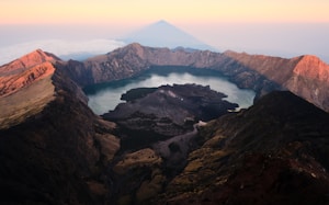 a mountain range with a lake in the middle of it