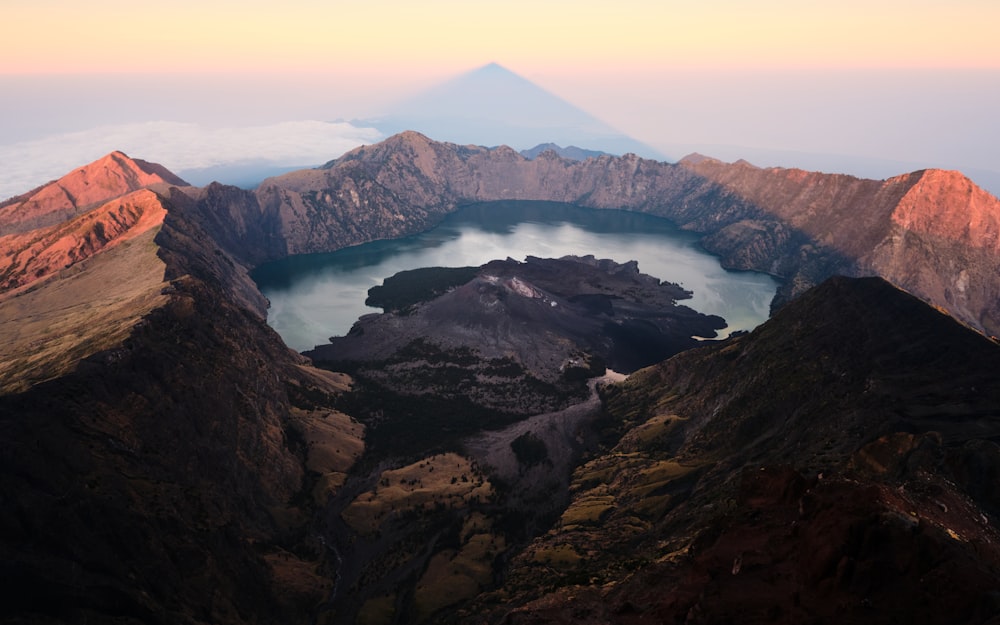 a mountain range with a lake in the middle of it