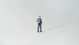 Side view of a 3D printed collectible figurine standing 15 cm tall with subtle gray shading.