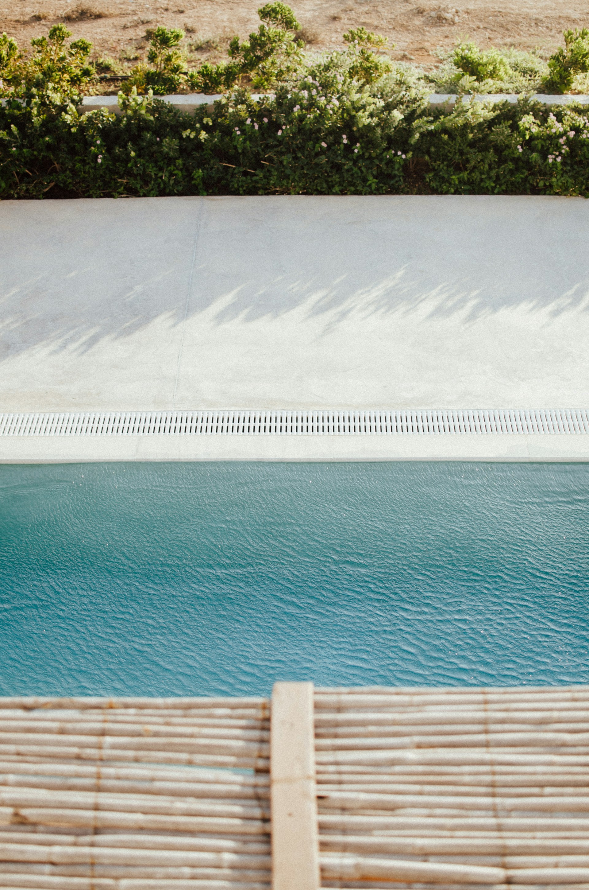 woman wearing yellow long-sleeved dress under white clouds and blue sky during daytime