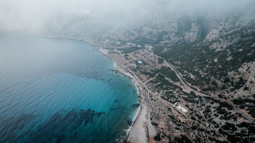 an aerial view of a beach and a body of water