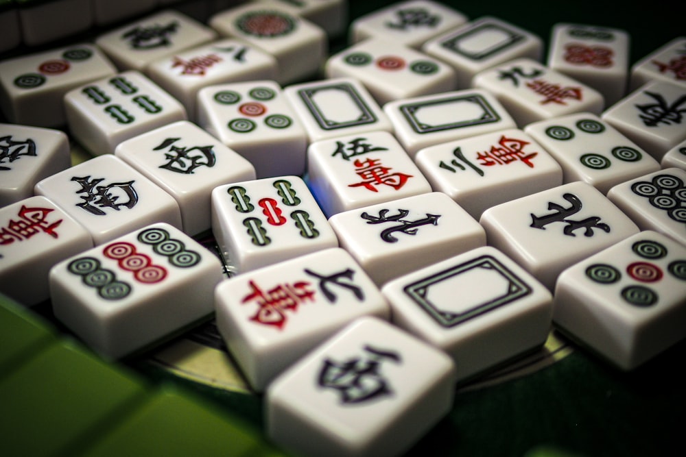 a close up of a bunch of dices on a table