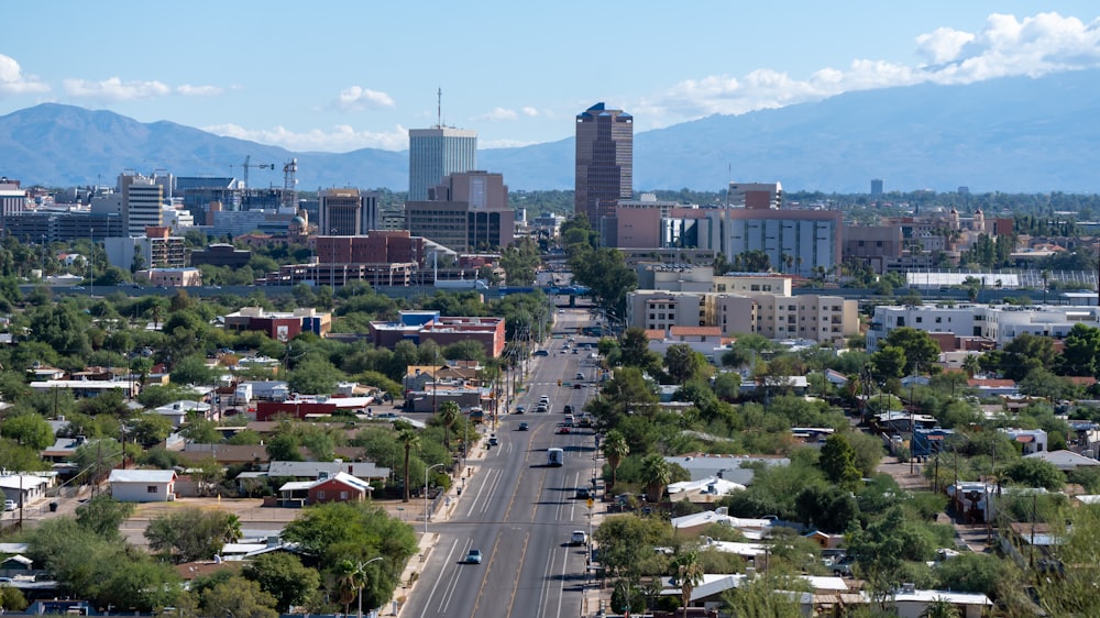 a view of a city with mountains in the background