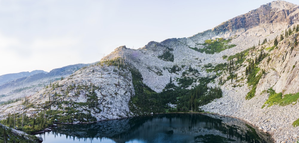 a mountain with a lake in the middle of it