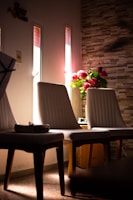 Cozy therapy room with soft lighting and comfortable chairs.