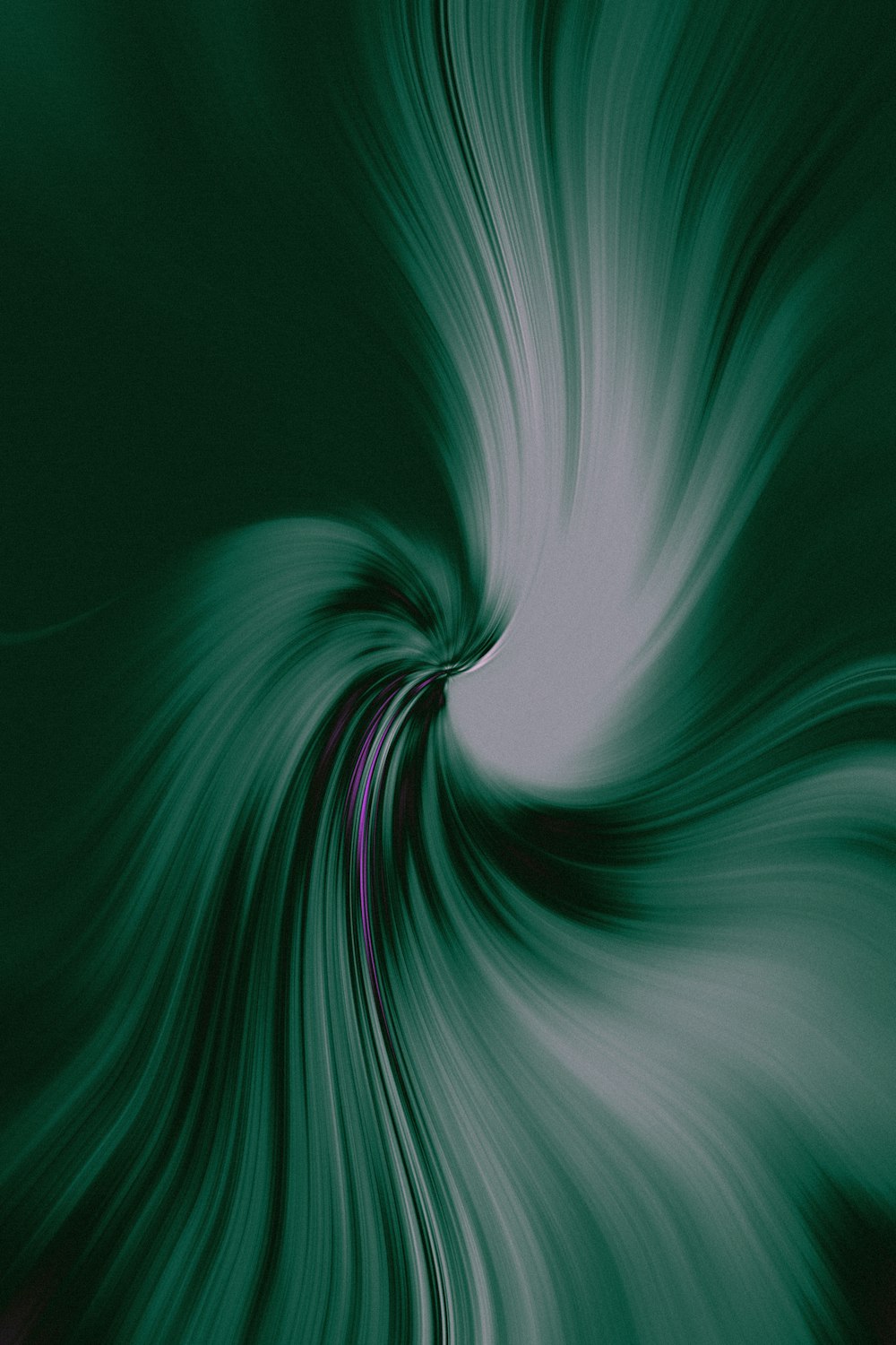 a green and white swirl with a black background