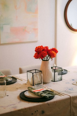 An elegant dining table set with neutral tones.