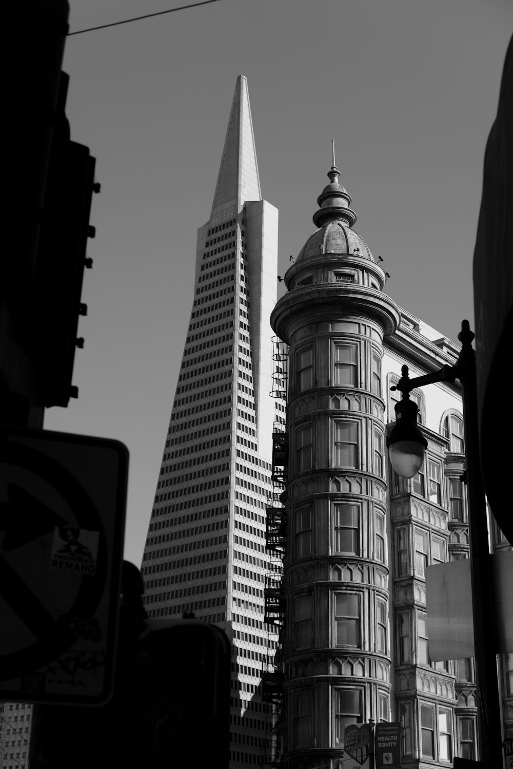 a black and white photo of a tall building