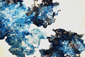 An abstract contemporary painting with fluid forms and contrasting light and dark areas.