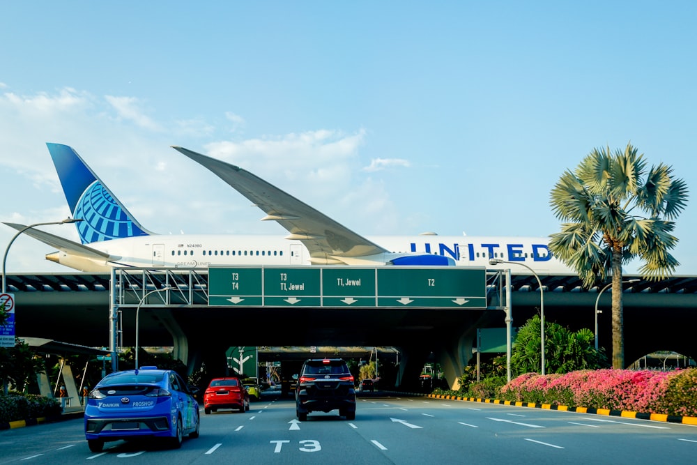 a large jetliner sitting on top of an airport runway