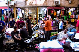 A vibrant marketplace scene with buyers and suppliers engaging in trade.