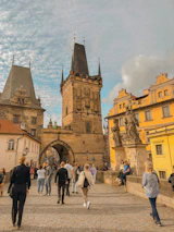 A group of tourists exploring a famous European landmark on a guided city tour.