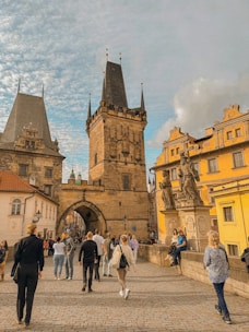 A joyful group of travelers exploring a famous European landmark together.