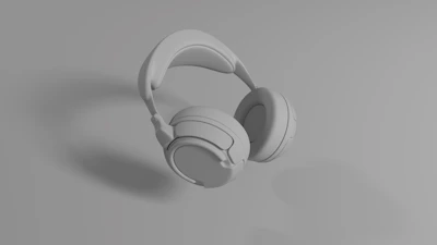 Stylish headphones with cushioned ear pads, set against a soft gray backdrop.