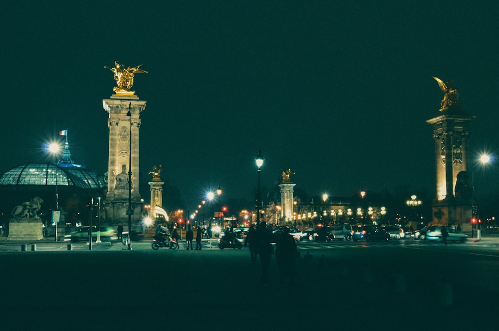 a couple of people that are standing in the street