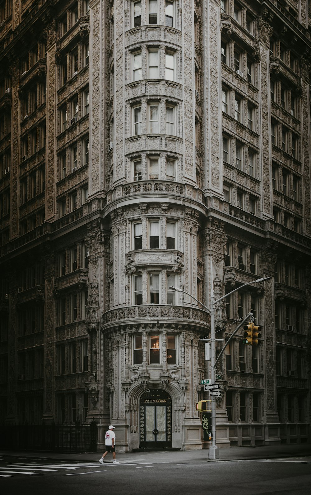 a tall building sitting next to a traffic light