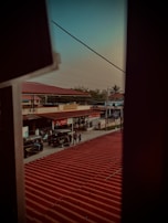 View of the surrounding neighborhood showing nearby shops and transport options.