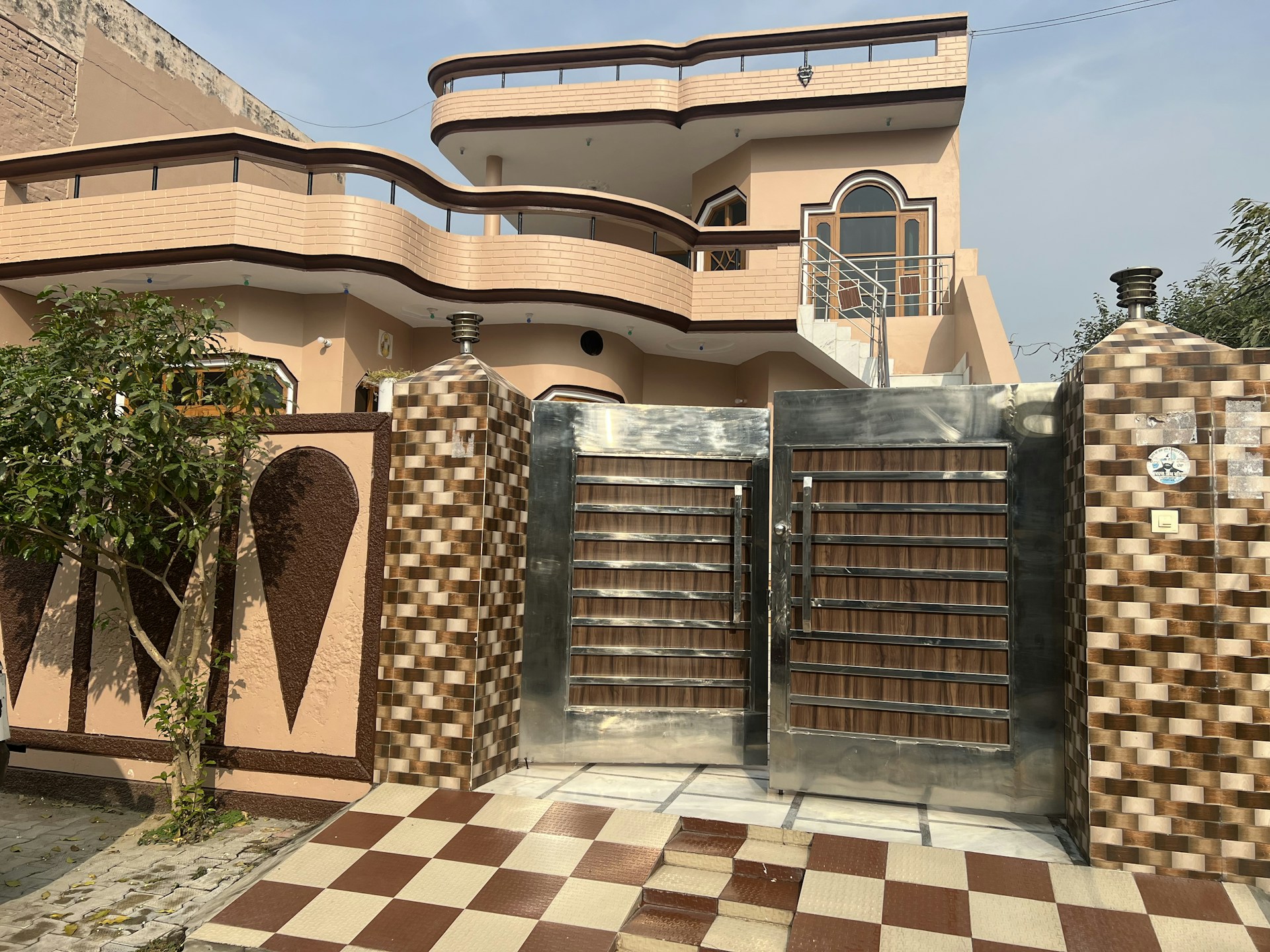 woman wearing yellow long-sleeved dress under white clouds and blue sky during daytime