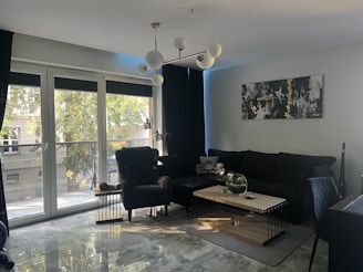 A beautifully lit modern living room showcasing elegant lighting fixtures.