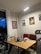 A cozy workspace featuring stylish decor and organized shelving for productivity.