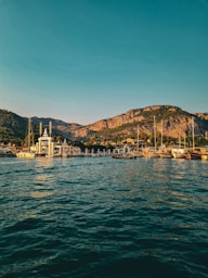 MG TURIZM a body of water filled with lots of boats