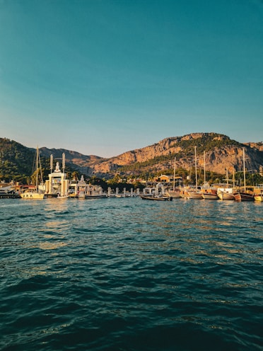 MG TURIZM a body of water filled with lots of boats
