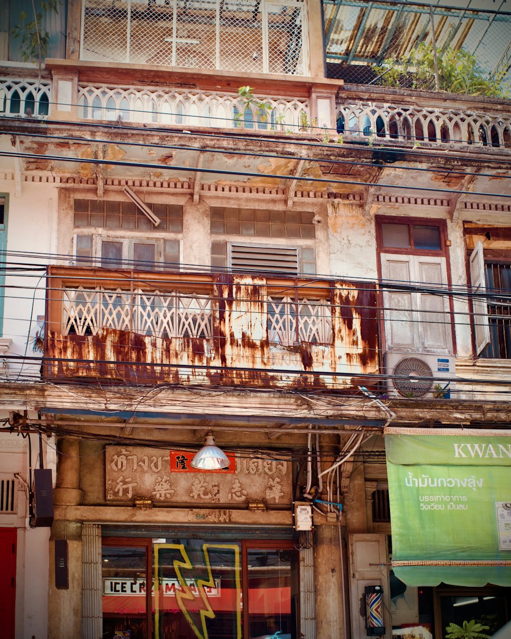 an old building with a balcony and balconies