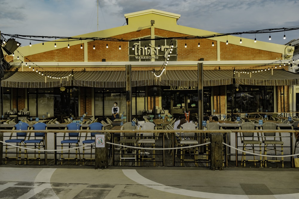 a restaurant with a lot of tables and chairs