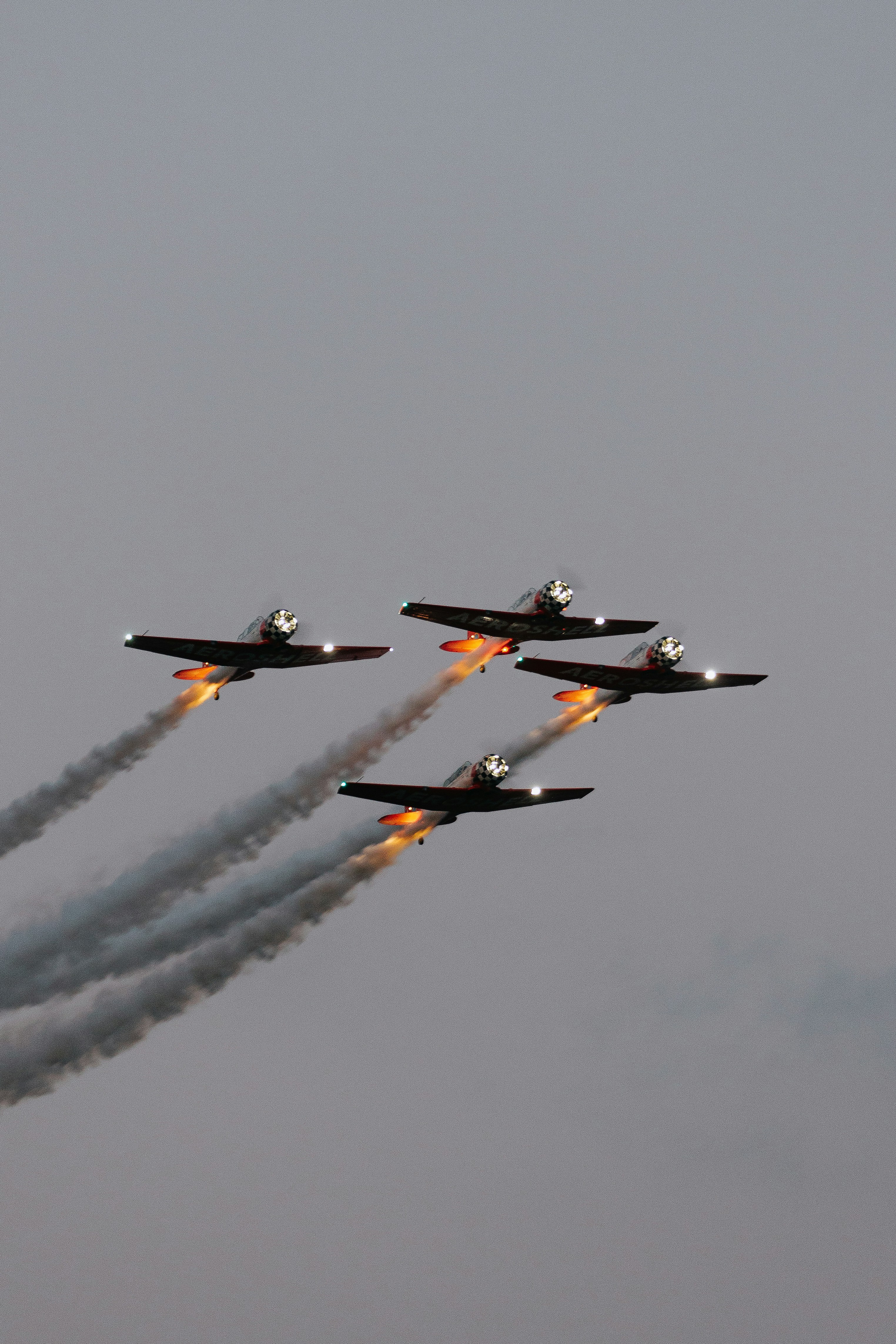 A group of fighter jets flying through a cloudy sky photo – Free Animal ...