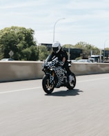 A rider enjoying a smooth ride on a Taruqa motorcycle.