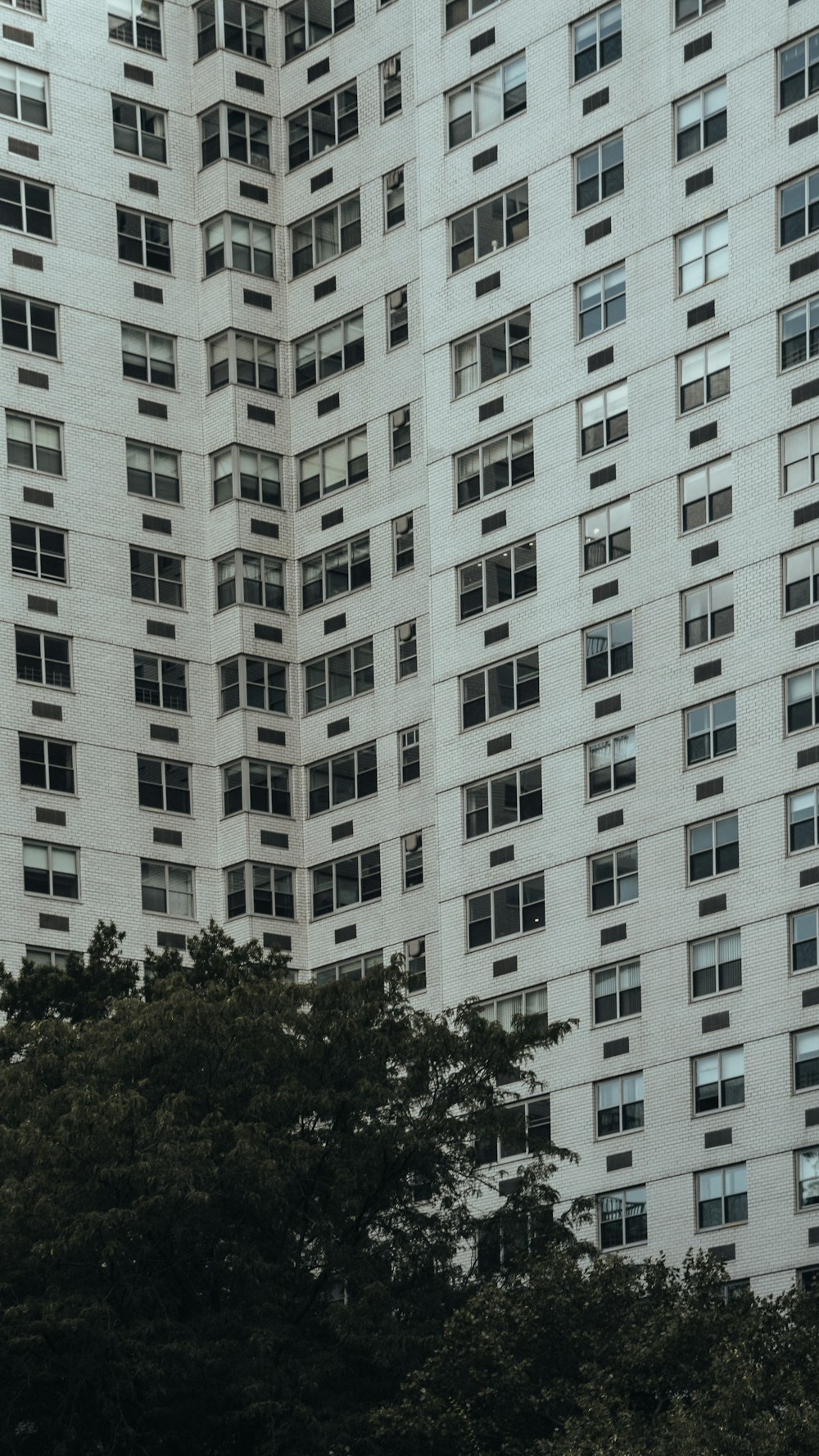 a large white building with lots of windows