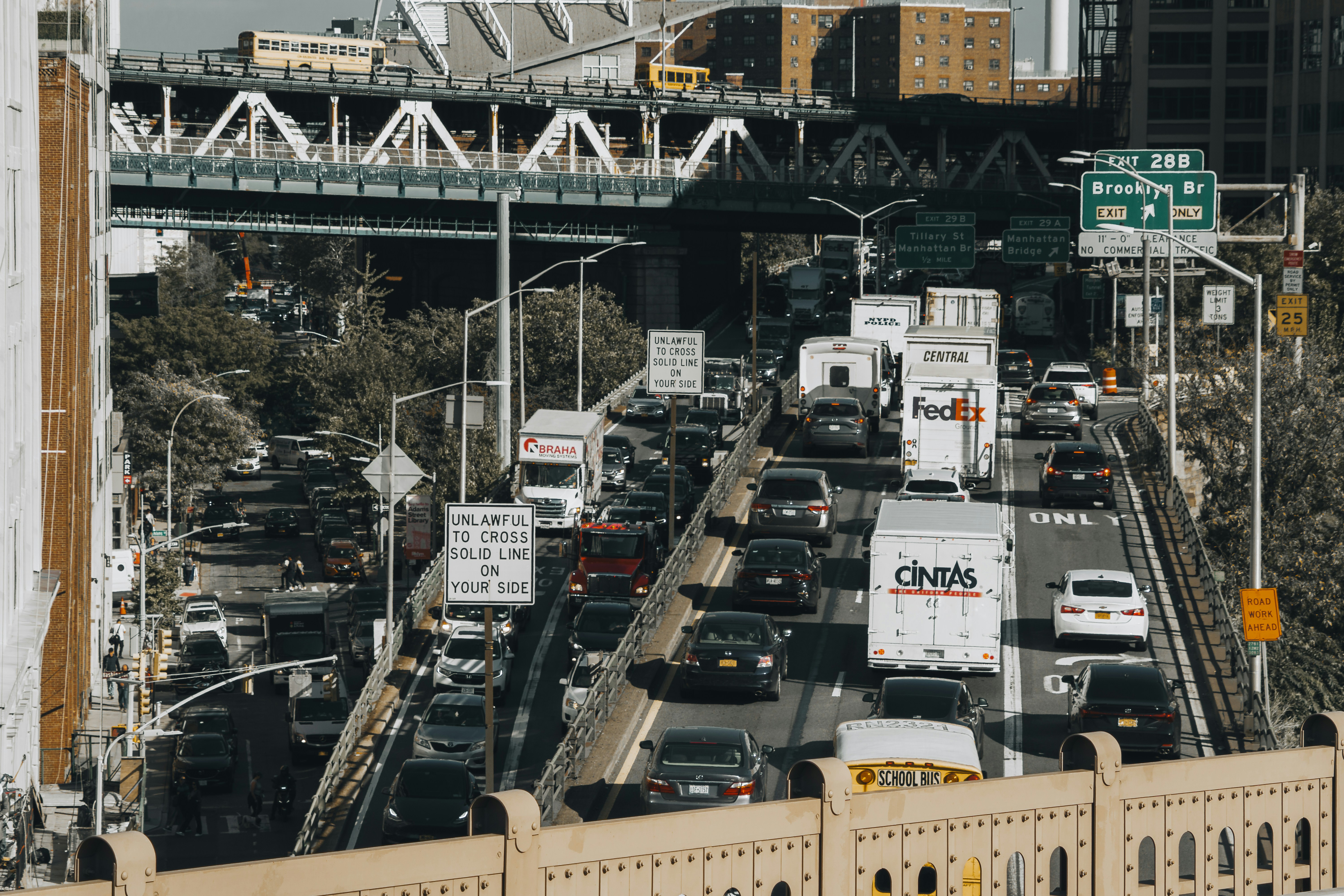 a bunch of cars that are in the street