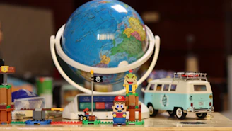A globe with highlighted global connections linking trusted toy manufacturers.