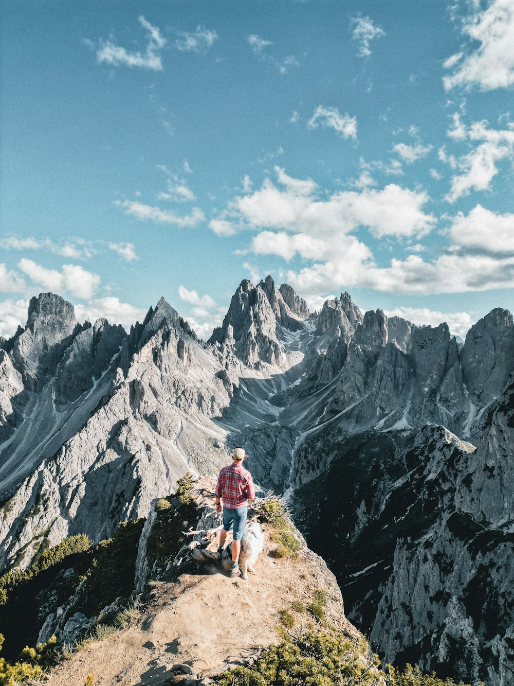 a man standing on top of a mountain