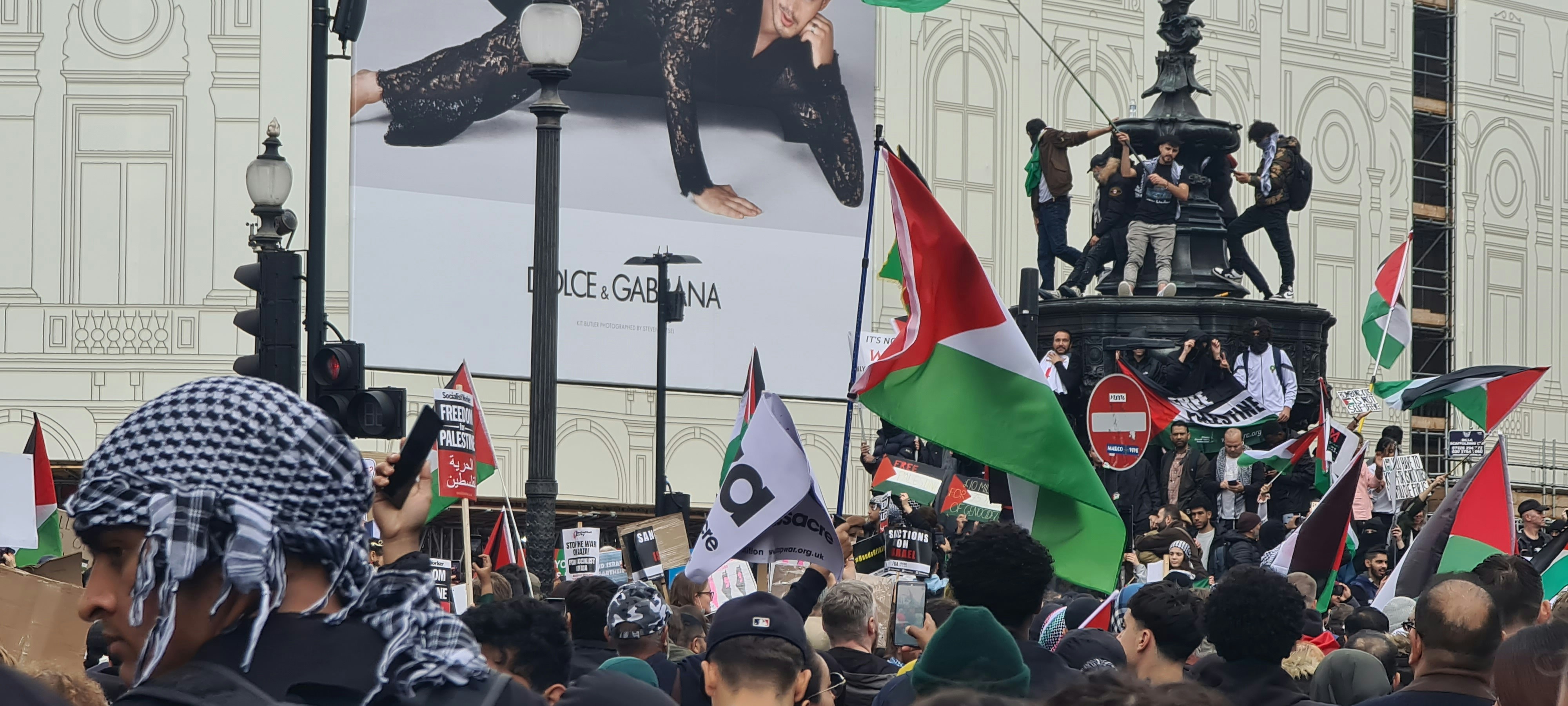 a large group of people standing in front of a building