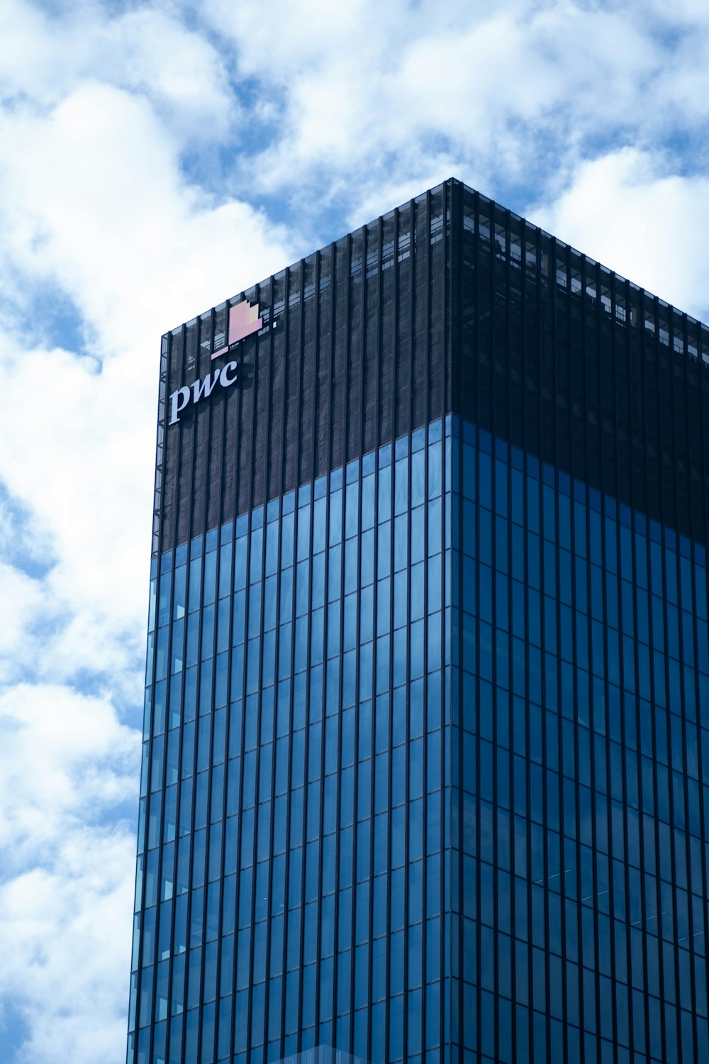 a very tall building with a sky background