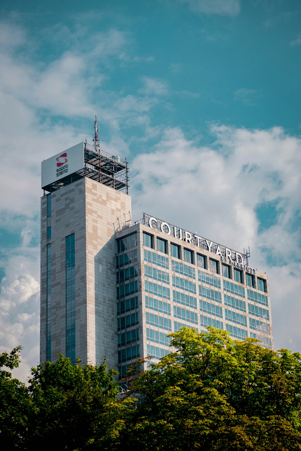 a tall building with a scaffolding on top of it