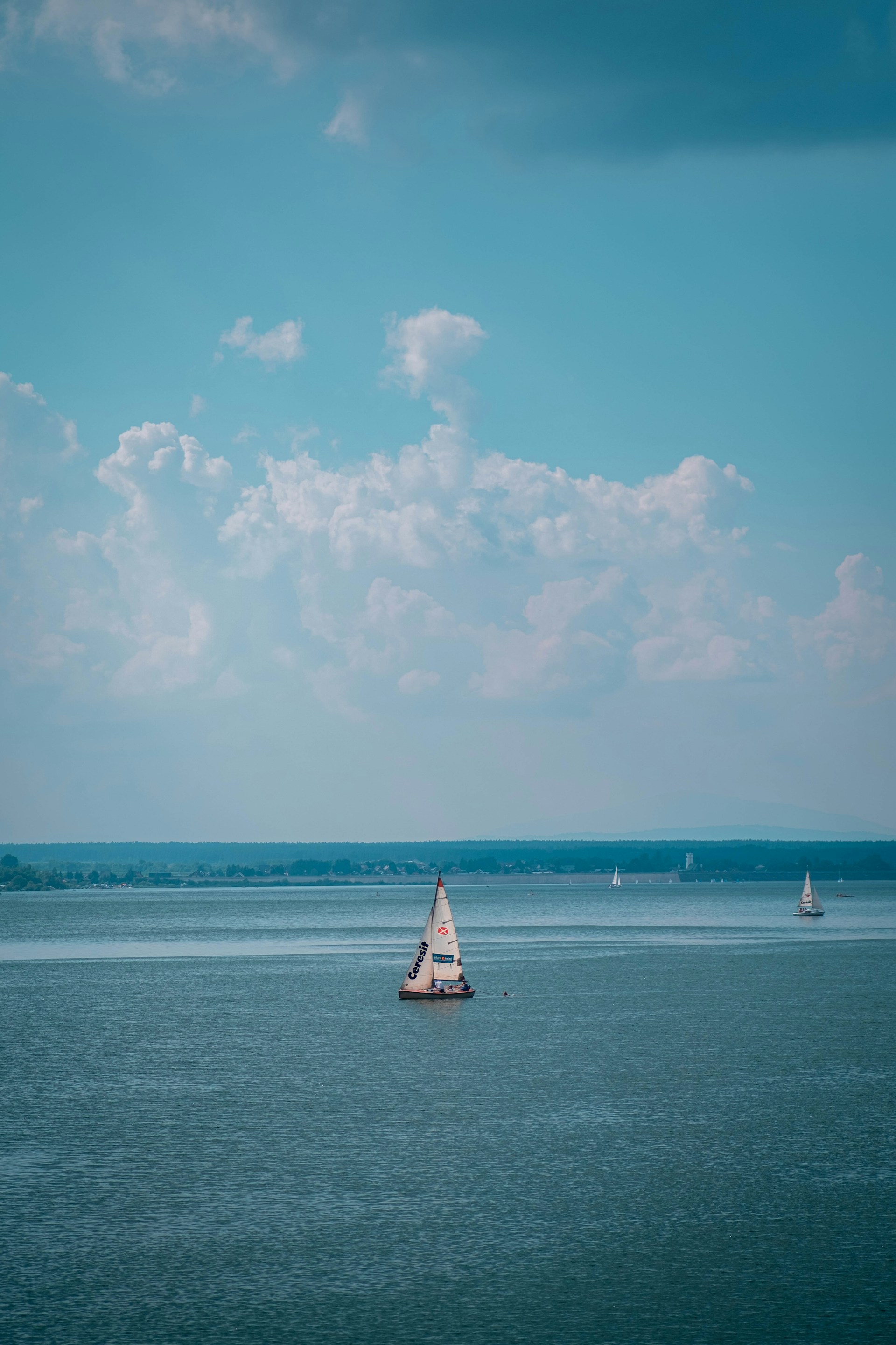 a sailboat in the middle of a large body of water