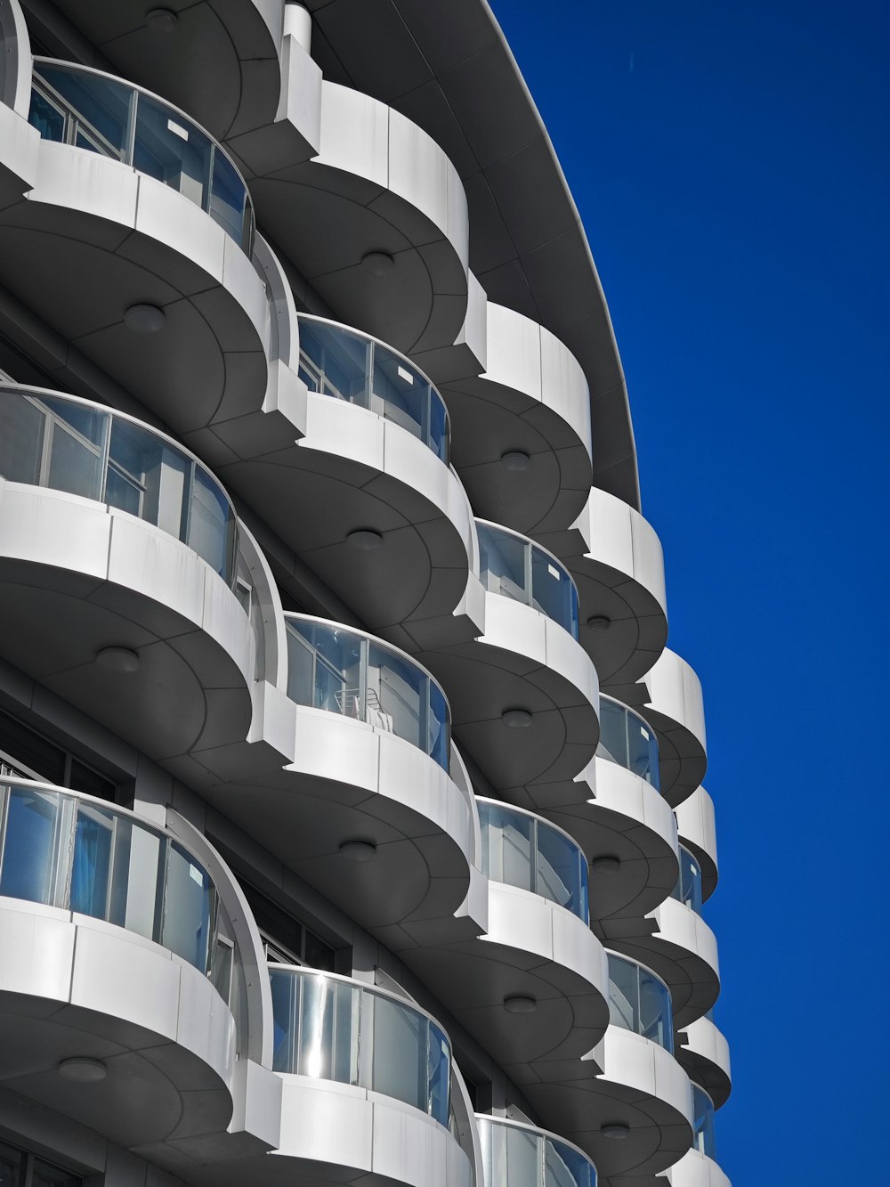 a tall building with balconies and balconies on it