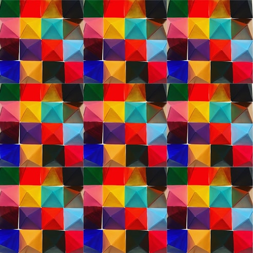 A vibrant pattern of multicolored geometric shapes arranged in a grid. Each square consists of smaller triangular sections with various colors like red, yellow, blue, green, and pink. The art has a modern and abstract style, forming a repetitive and symmetrical design.