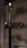 A close-up image of a metal stand with a clamp labeled 'GUARD LOCK.' The background is blurred, giving a shallow depth of field effect.